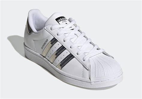 adidas superstar dames zilver wit|white Adidas Superstar sneakers.